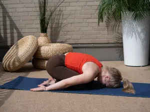 Yoga-Haltung Kindhaltung (Balasana)